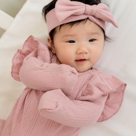 Baby Girl Long Sleeve Ruffle Romper in Plum Pointelle Cotton